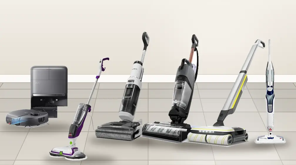 Electric mops on a tile floor: vacuum mops, a spin mop, a steam mop and a robot mop with its dock