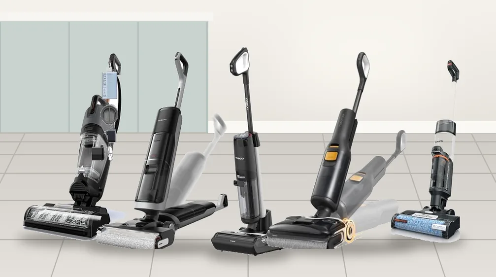 Five wet dry vacuum mops standing on a tile kitchen floor
