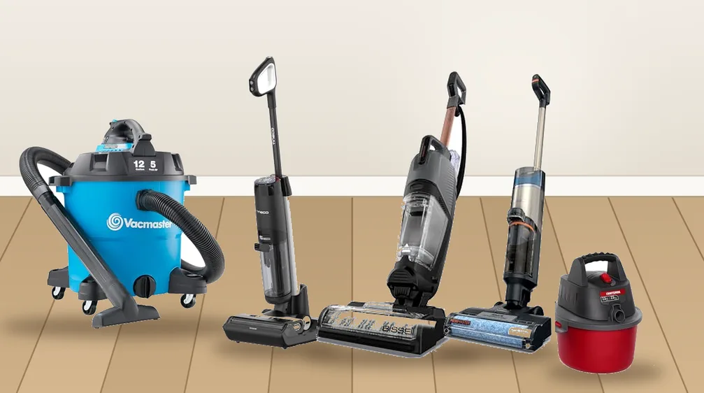 Wet dry vacuums including a shop vac and cordless vacuum mops on a wood floor